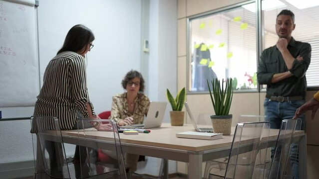 Diverse Group Of People Preparing A Project In An Office.