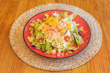 Romaine lettuce and croutons salad with lemon juice, olive oil, egg, Worcestershire sauce, anchovies, garlic, Dijon mustard, Parmesan cheese and black pepper