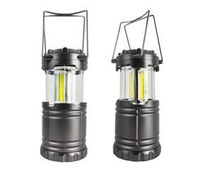 Isolated photo of gray colored led camping lantern on white background. © breakermaximus