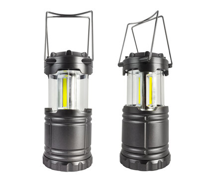 Isolated photo of gray colored led camping lantern on white background.