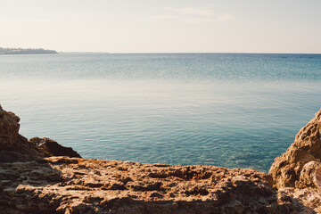 Beautiful view on open sea, rocks in first plan