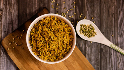 SPROUT RICE INSIDE WHITE SERVING BOWL WITH BLACK BACKGROUND