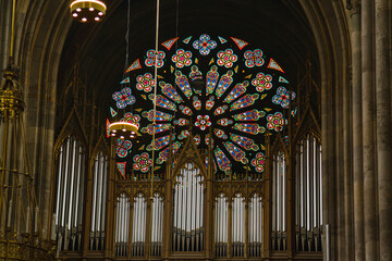 Wonderful pipe organs and colorful stained glass. Interior Votive Church, Votivkirche, neo-Gothic...
