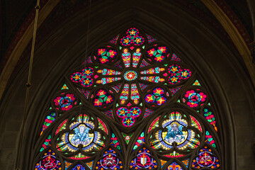 Church vitrage glass, stained glass mandalas. Interior Votive Church, Votivkirche, neo-Gothic...