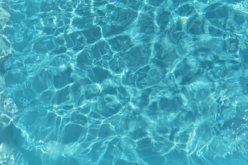 Fototapeta na wymiar Background of a water in a swimming pool.