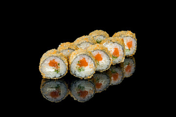 Hot roll with salmon tempura on black with reflection