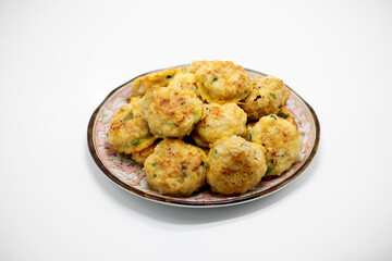 frying on a plate on a white background
