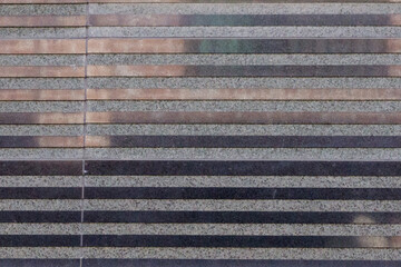 Light brown and light black marble wall