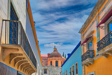 Scenic cobbled streets and traditional colorful colonial architecture in Guanajuato historic city...