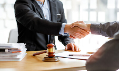 Legal law, advice and justice, Business people and lawyers shaking hands discussing contract agreement, law advice, legal services concepts.