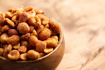 Honey Roasted Peanuts on a Wooden Table