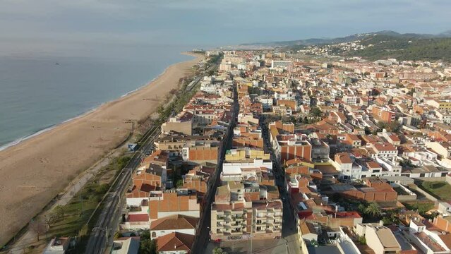 Aerial drone view of Malgrat de Mar city in Spain Maresme tourist town beach views