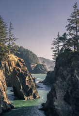 Sunset on natural bridges along the west coast of the Pacific Ocean, Oregon during the golden hour...