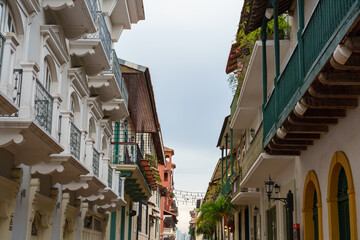 Looking down a corridor of balconies in Casco Viejo Panama City