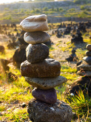 Fototapeta na wymiar Set of stacked stones in the valley