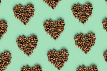 Shape heart from coffee beans on mint color background, roasted brown coffee berries, trendy design geometric pattern, top view, minimal flat lay
