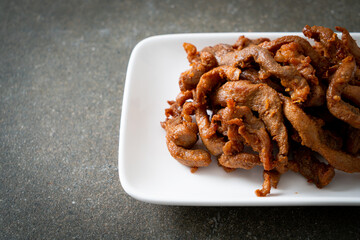 Sun-Dried Pork on white plate