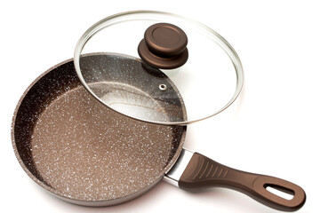 New frying pan with a glass lid on a white background