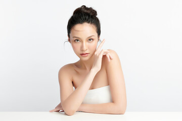 Obraz premium Beautiful young asian woman with clean fresh skin on white background, Face care, Facial treatment, Cosmetology, beauty and spa, Asian women portrait.