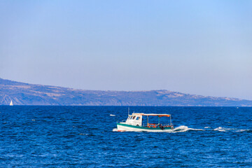 Obraz premium Pleasure boat sailing on the Black sea in Nessebar, Bulgaria