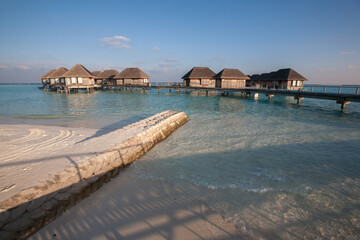 Water Bungalows in Turquoise Sea at Maldives