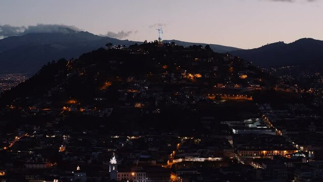 Aerial shot of El Panecillo in Quito Ecuador at Nigth
