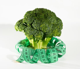 Broccoli, centimeter on white backgrounder. Sports Diet.