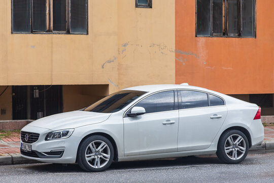 Side; Turkey &ndash; February 01 2022:  white Volve s60   is parked  on the street on a warm  day against the backdrop of a buildung