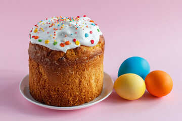 Easter cake and eggs on kitchen table.