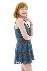 Isolated cutout studio full body shot of Asian young sexy blonde short hair female fashion model in camisole dress and sneakers standing holding hand touching lips crossed arm on white background