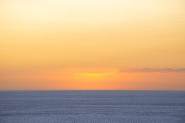 Sunset colors in the sky in the sea