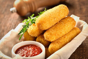 POTATO CROQUETTES with ham and cheese and sauce