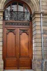 Rustic Double Wooden Door on french wall street facade