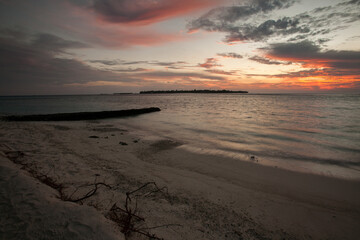 Sunrise over the Maldives Beach