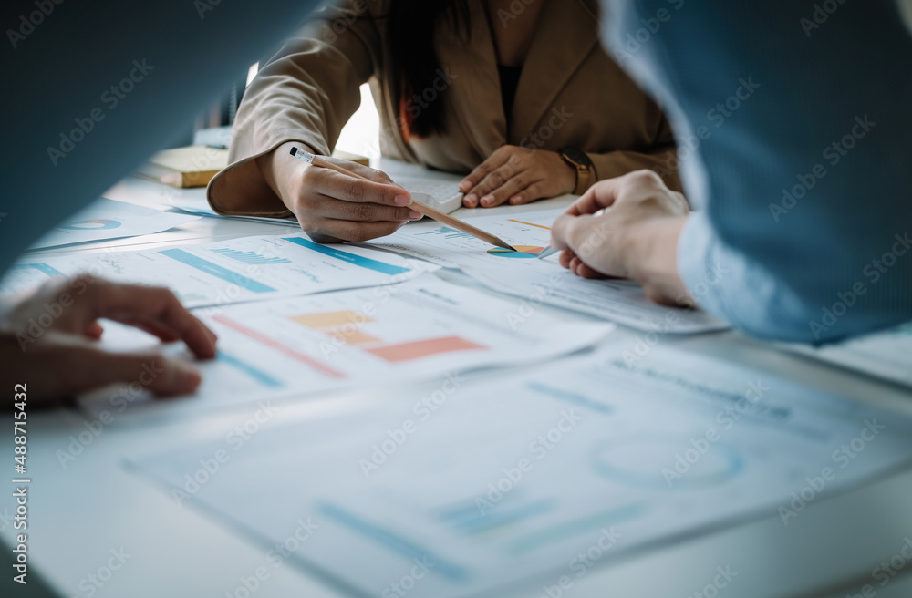 Aufkleber businessteam working with new startup project. discussing the charts and graphs showing the results 