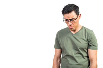 Upset male nerd in glasses looking down