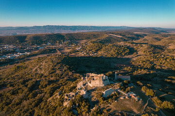 Fototapeta na wymiar Aerial view of a Medieval ruined stone castle on the mountain, Aumelas Castle in France