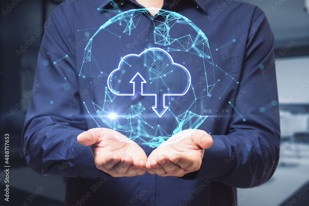 Poster Close up of businessman hand holding abstract glowing polygonal sphere with cloud and arrows on blurry office interior background. Cloud computing and database concept. Double exposure.