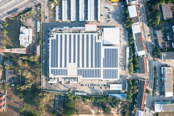 Eco building or supermarket in aerial view consist of solar or photovoltaic cell in panel on top of...