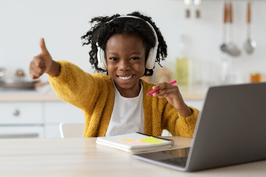 Homeschooling. Portrait Of Happy Black Preteen Girl Study With Laptop At Home