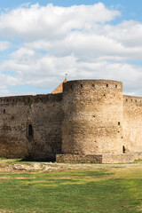 Fototapeta na wymiar Old fortress against the sky. Ackerman tower. Historical place. For archive