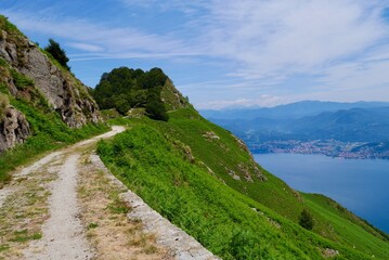 Fototapeta na wymiar Old military road in the mountains above Lake Maggiore offering splendid views. Lombardy, Italy.
