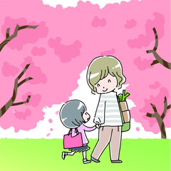 手を繋いで歩く親子