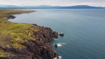 Russia, the Kuril Islands, Iturup Island, The Yankito lava plateau on Pacific coast.