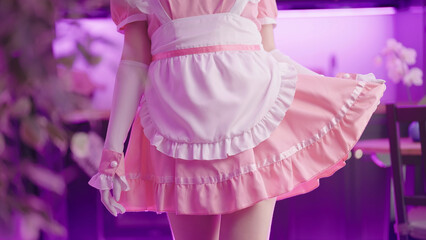 Headless retro pink maid anime cosplay girl hold up the skirt