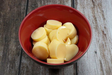 Pile of sliced egg tofu dressing with soy sauce serving in the bowl. Famous appetizer menu in Asia restaurant. 
