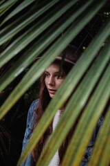 Fototapeta na wymiar portrait of a girl in the jungle 