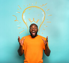 Happy afro man has a big creative idea