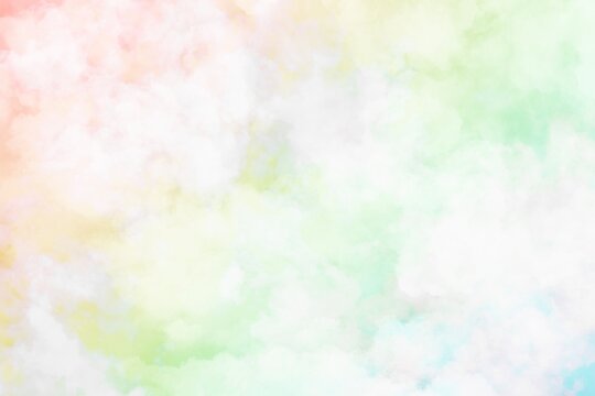抽象背景）淡い虹色の雲　幻想的　グラデーション　ふわふわ　イースター　パステルカラー