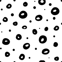 Stylish and minimalistic modern seamless pattern with black circles and dots